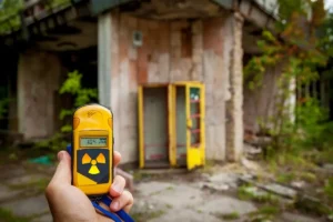 Radon testing device near house in Michigan, Total House Inspection services.